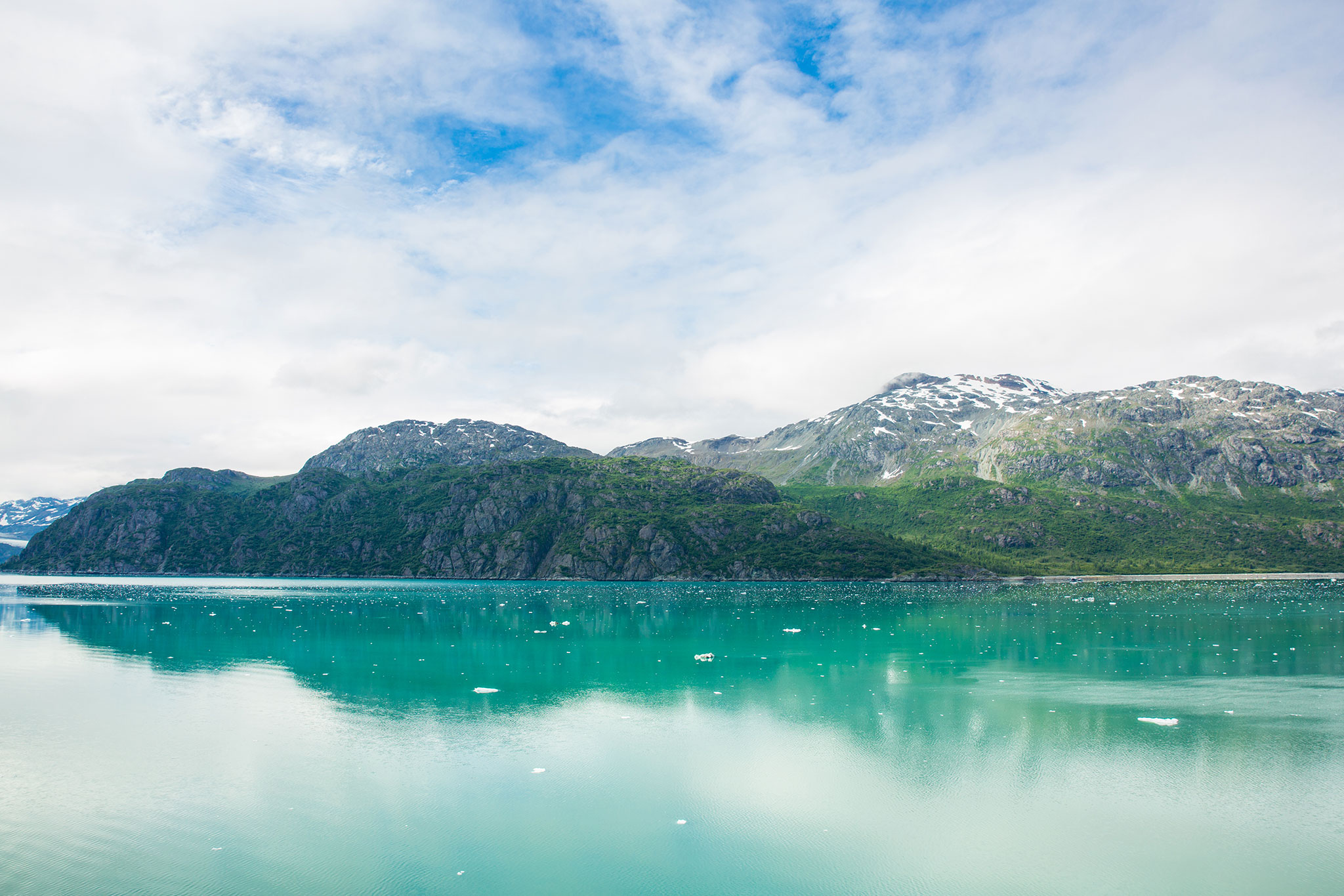 Turquoise waters and snowcapped mountains 