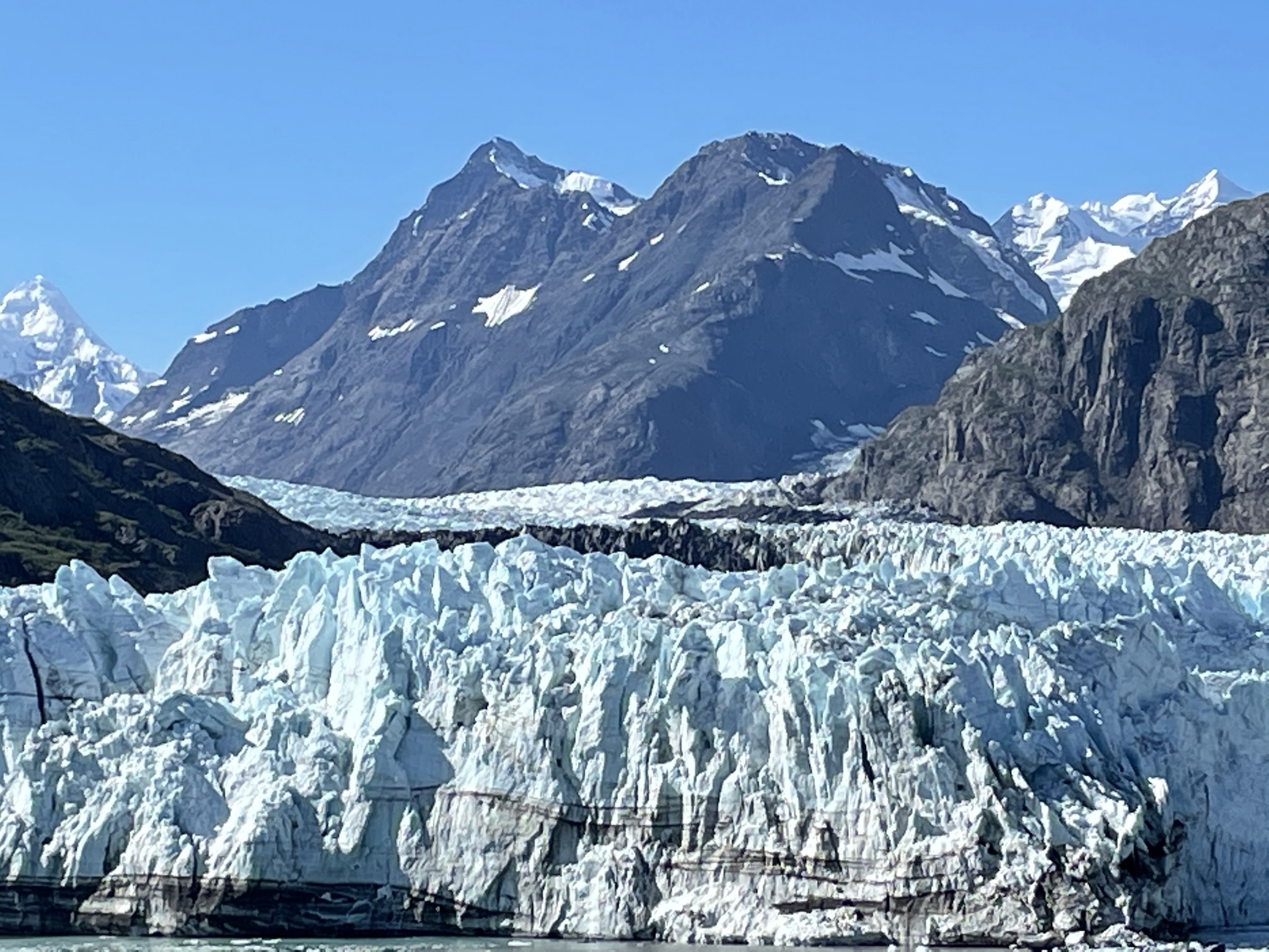 Icy blue glaciers and rocky mountains at Glacier Bay National Park and Preserve