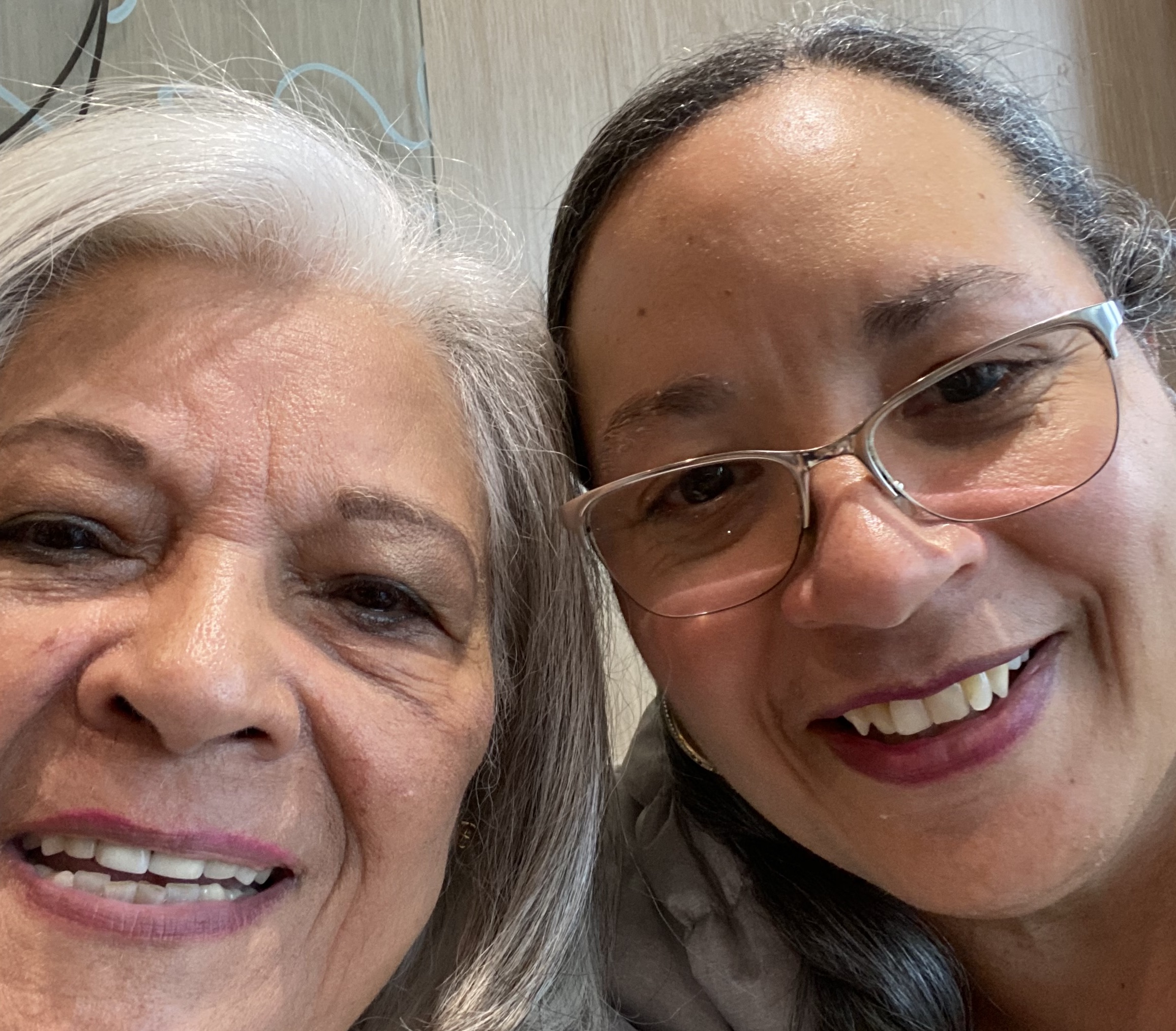Two ladies smile for an up close selfie on a Turning Point Alaska cruise