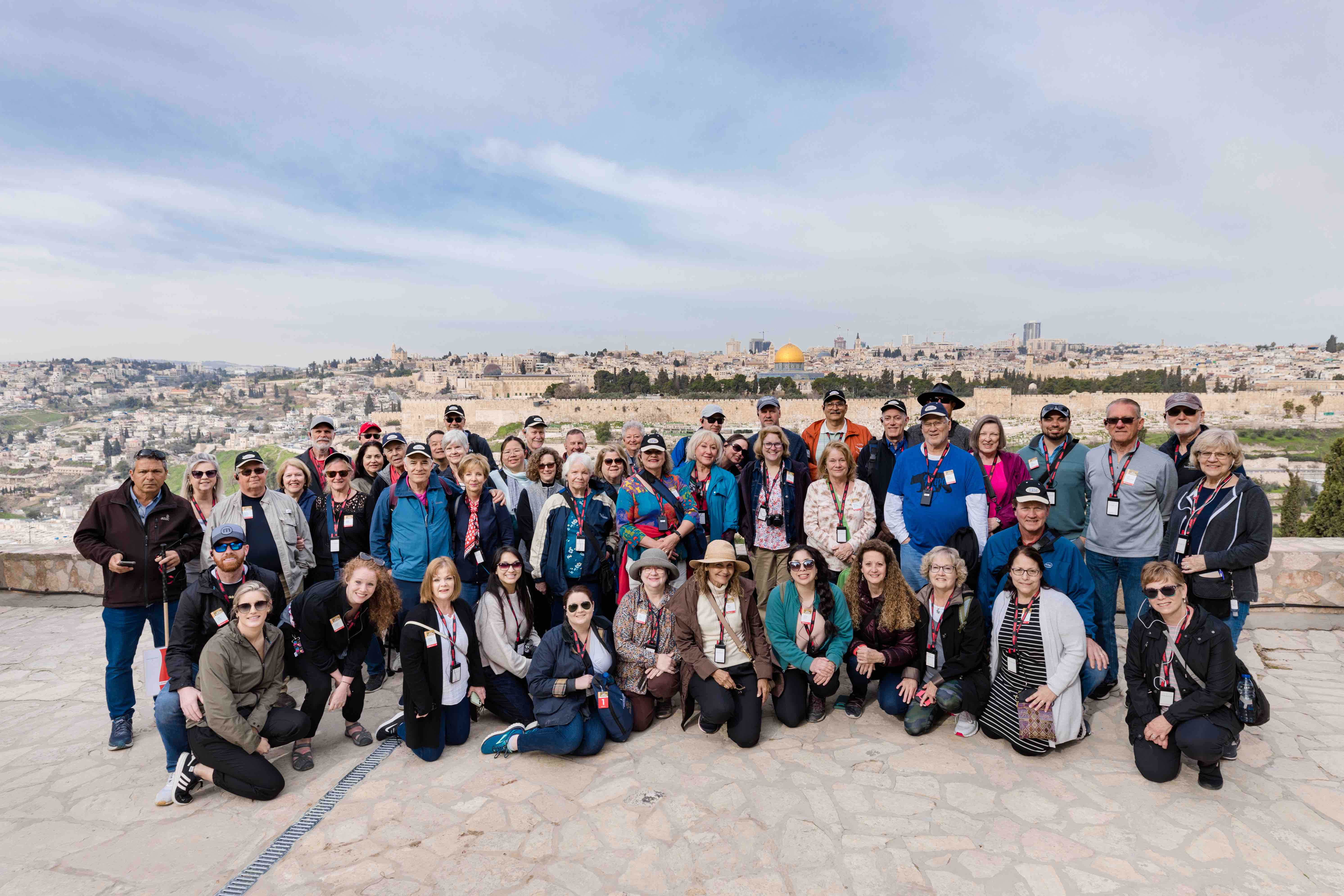 Inspiration tour group standing together with the city of Jerusalem in the background