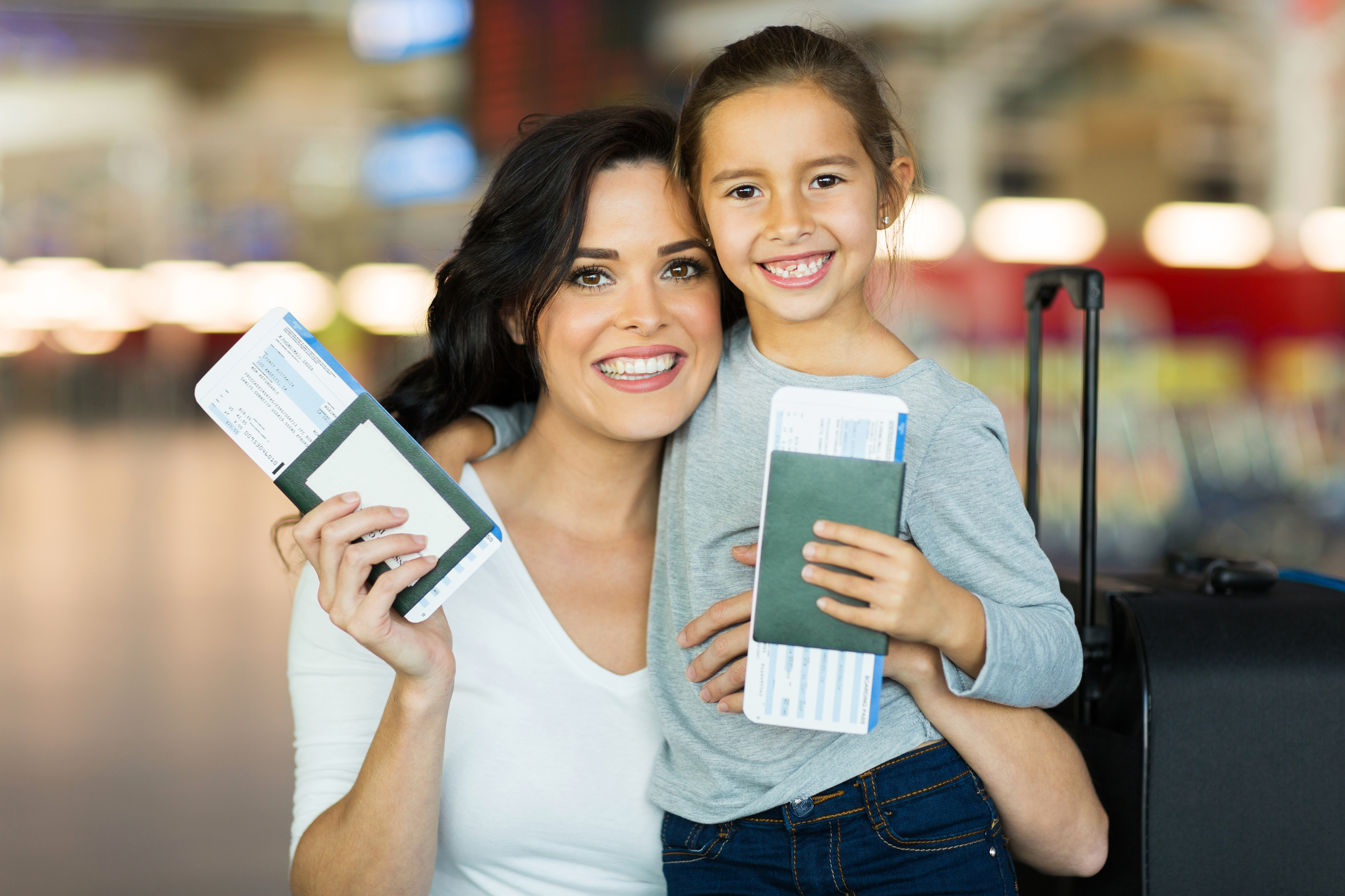 mom and child with passports