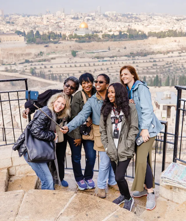 A group of women smiling for a selfie