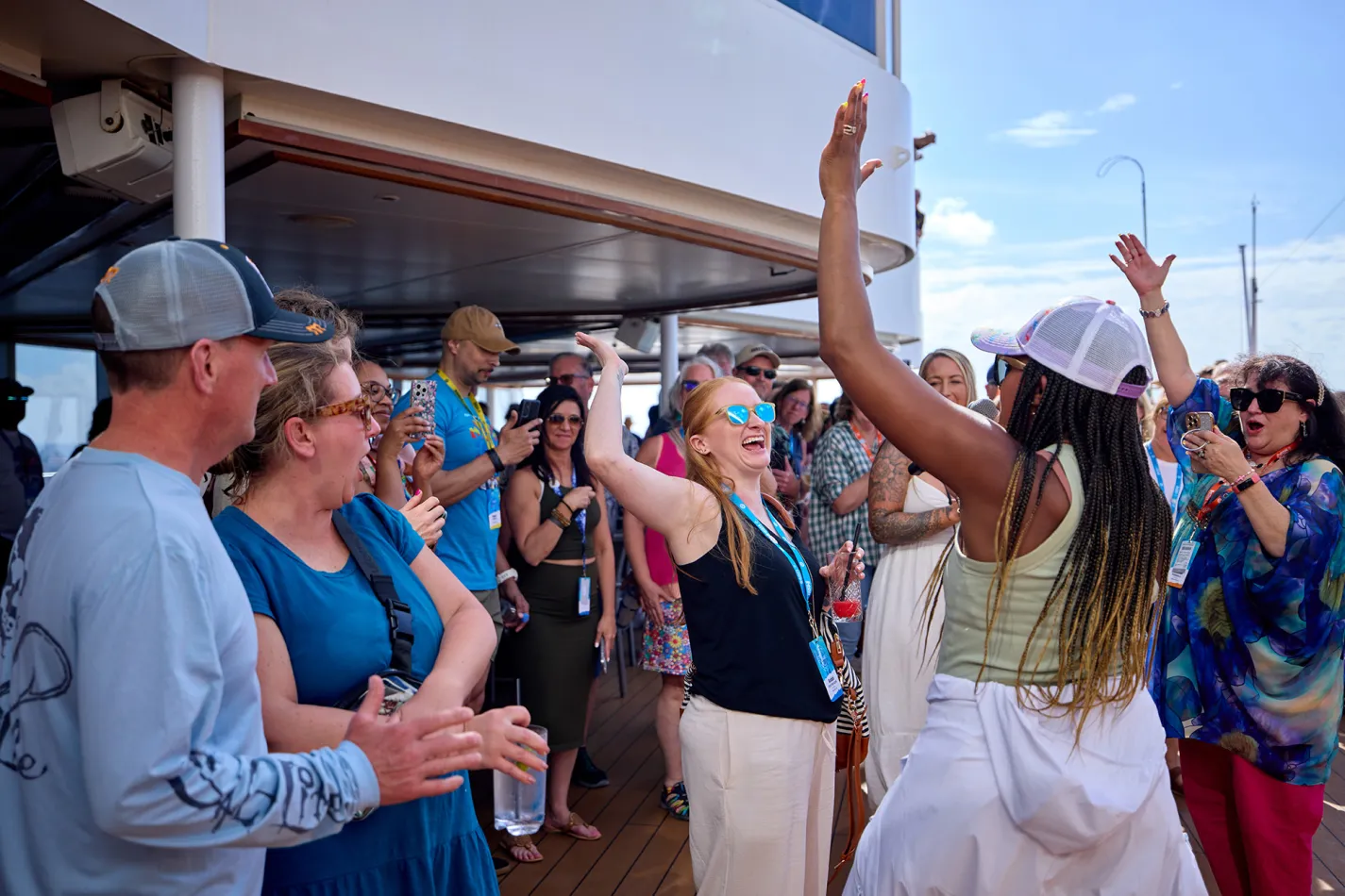 People gathered together cheering 
