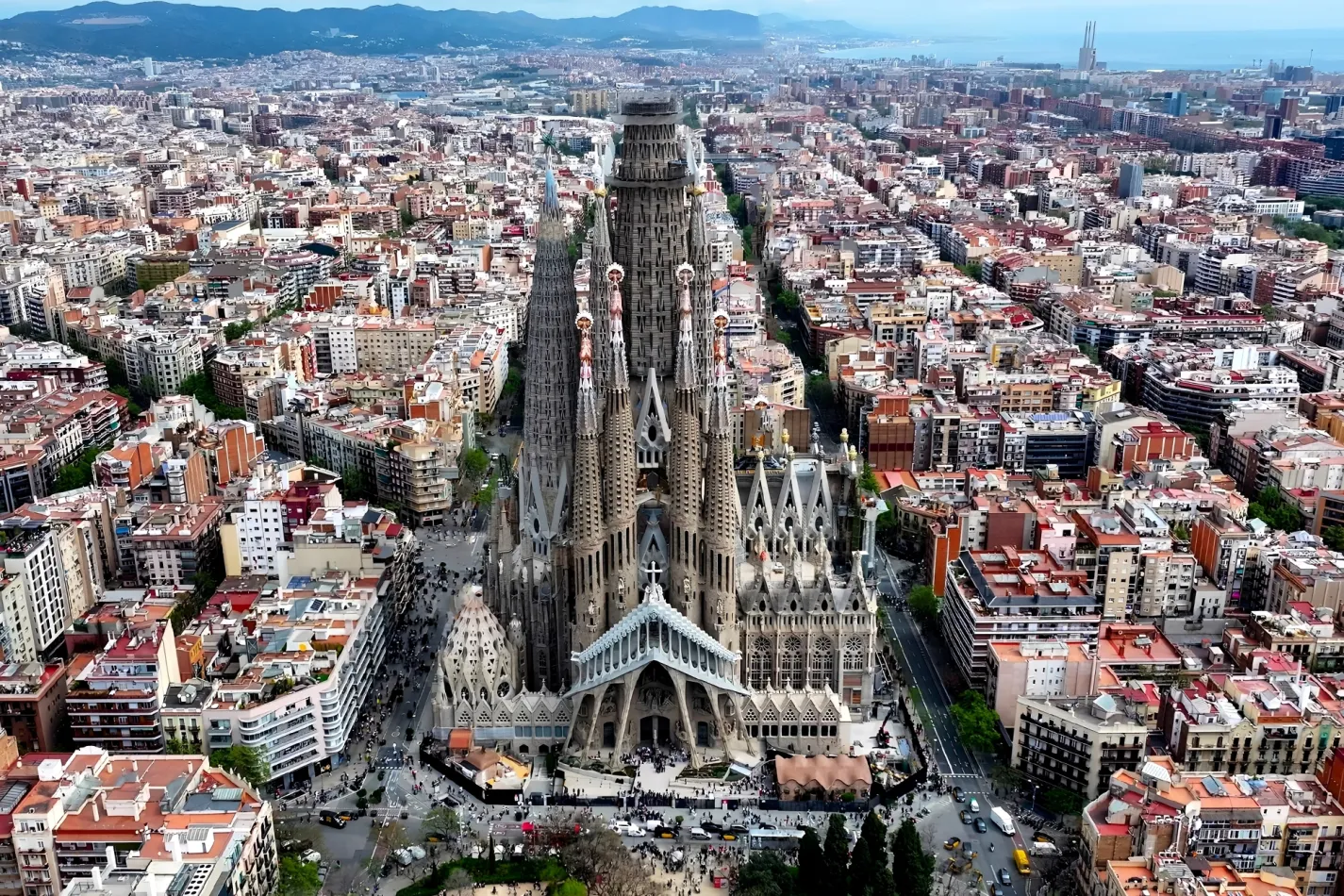 Aerial view of the Sagrada Família rising above the Barcelona cityscape, Spain