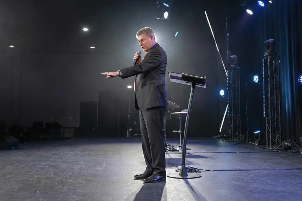 Lance Wallnau speaking on a stage