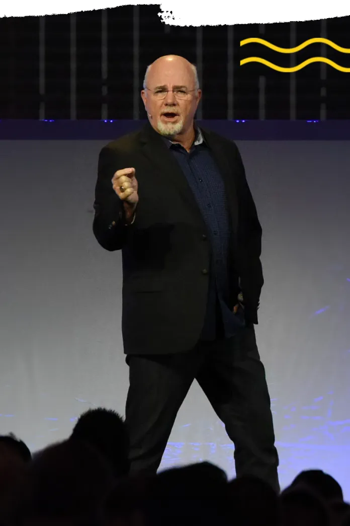 Dave Ramsey speaking on a stage