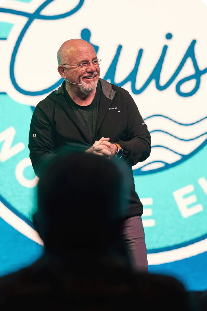 Dave Ramsey speaking on a stage