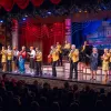 Musicians and band on a stage