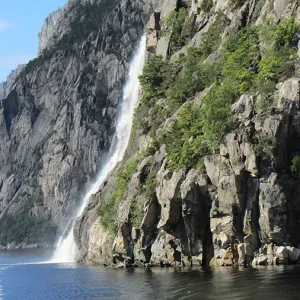Waterfall running down a rocky mountain