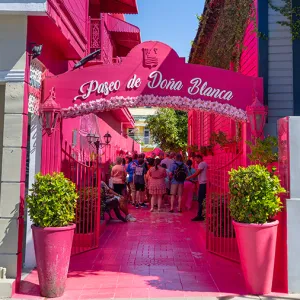 Bright pink entrance to Paseo de Doña Blanco